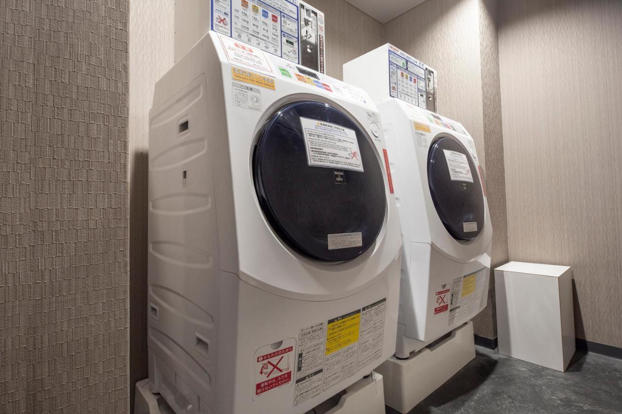 เดอะ รอยัล พาร์ค โฮเทล ไอคอนิก เกียวโต Hotel ภายนอก รูปภาพ A washing machine