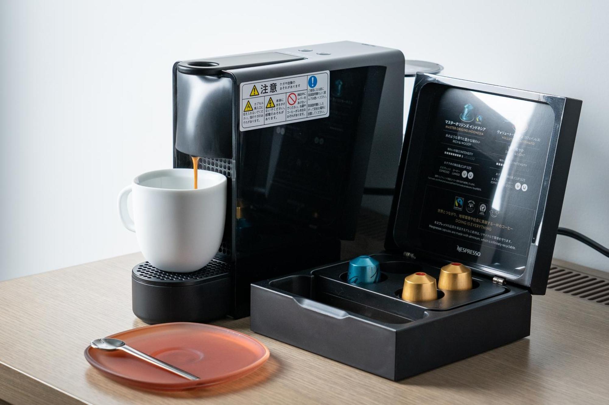เดอะ รอยัล พาร์ค โฮเทล ไอคอนิก เกียวโต Hotel ภายนอก รูปภาพ A Nespresso coffee machine
