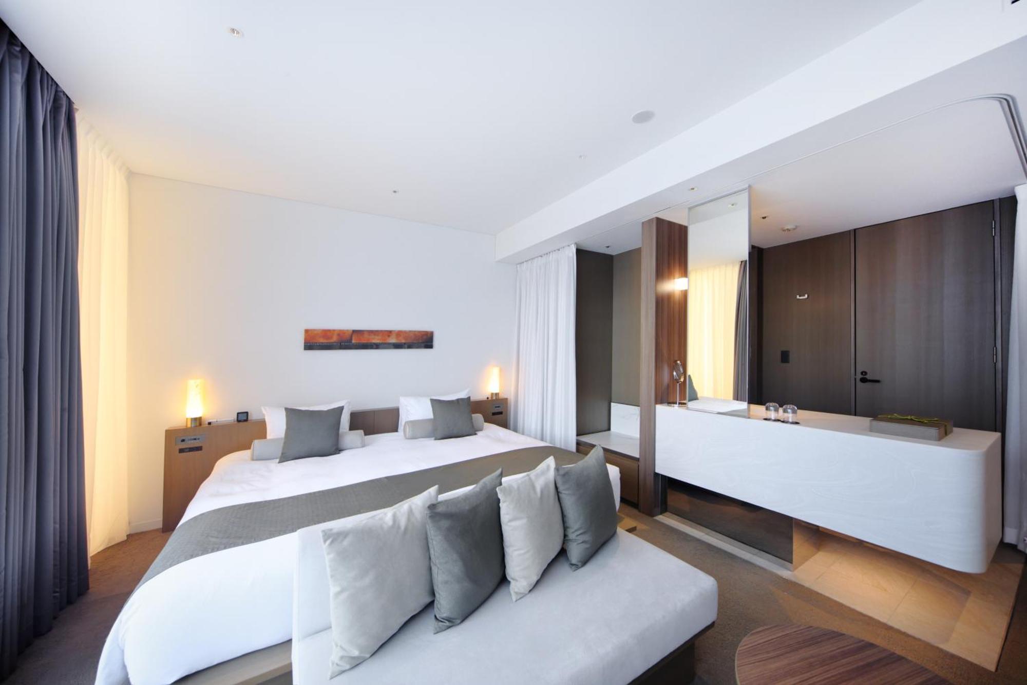 เดอะ รอยัล พาร์ค โฮเทล ไอคอนิก เกียวโต Hotel ภายนอก รูปภาพ A bedroom at the hotel